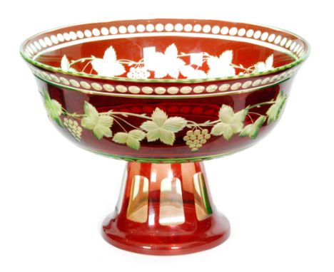 A 1930s Loetz glass pedestal bowl shape PN 111-2410, the tapering foot rising to a wide flared bowl flashed in ruby over uran