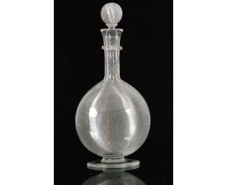 A large late 19th Century Stevens and Williams Verre de Soie crystal glass decanter, of footed compressed globe and shaft for