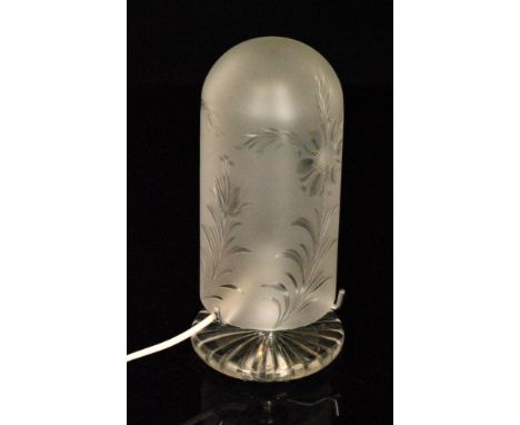 A 1930s Stuart and Sons glass lamp of domed form, the shade in a frosted finish cut with stylised floral decoration to a clea