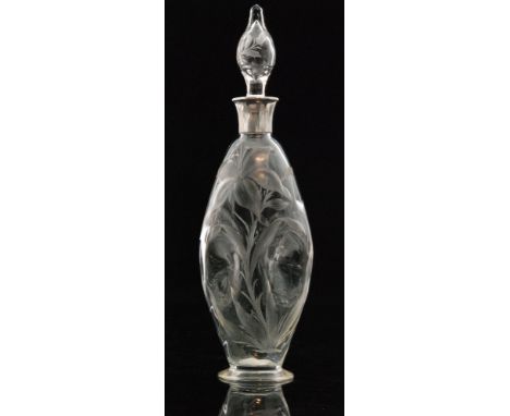 An early 20th Century Bohemian glass decanter possibly by Moser or Harrach, of footed dimpled form with applied hallmarked si