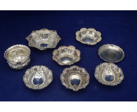 A set of three Victorian silver dishes, by James Deakin &amp; Sons, Chester 1897, with pierced borders, raised on bun feet; t