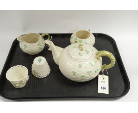 Belleek teapot, milk jug, sugar bowl and two pots.