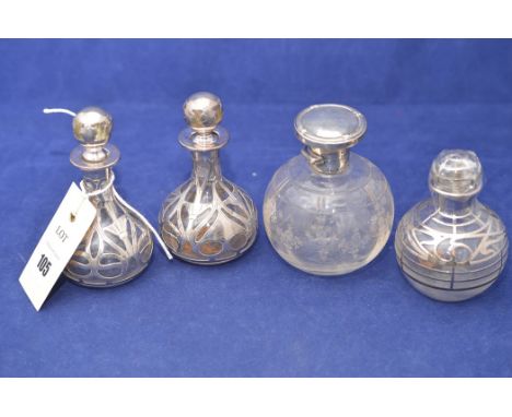 A George V silver mounted and glass scent bottle, Birmingham (indistinct makers mark) with etched floral decoration; a pair o