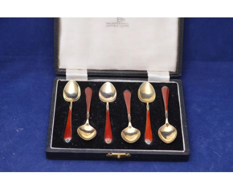 A set of six Elizabeth II silver gilt teaspoons, by Walker &amp; Hall, Birmingham 1959, with red guilloche enamel handles, in