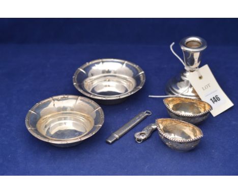 Pair of Edward VII silver dishes by Williams (Birmingham) Limited, Birmingham 1906; a silver candlestick with weighted base; 