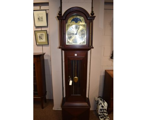 A reproduction longcase clock.