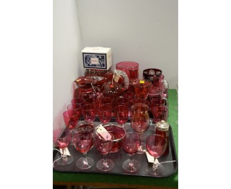 Cranberry glassware to include jugs, vases and glasses; together with Spode Eggcups