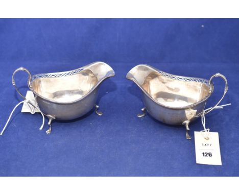 Pair of George V silver sauce boats by Walker &amp; Hall, Sheffield 1927, with pierced borders, 7.5oz.