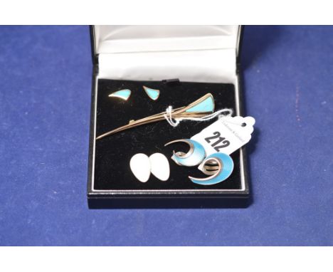 A 9ct. yellow gold bar brooch and matching earrings set with turquoise, 9.1grms gross; together with two pairs of enamel deco