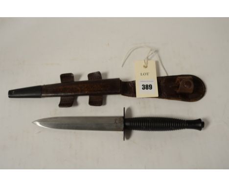 Fairbairn Sykes third pattern commando knife in leather scabbard.