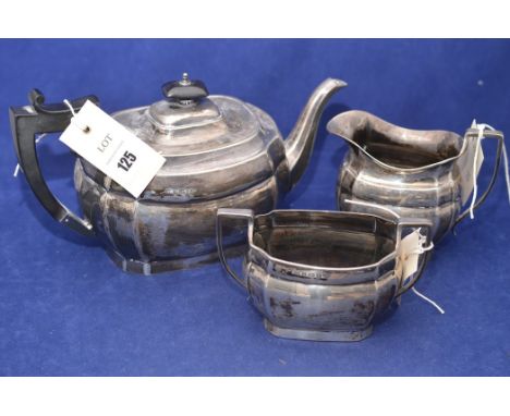 A George V three piece silver tea service by S C, Birmingham 1924, comprising teapot, cream jug and sugar bowl, 29.4oz gross.