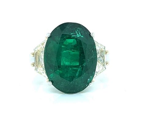 Platinum 10.41 Ct. Emerald &amp; Fancy Diamond Ring. &nbsp; &nbsp; &nbsp; &nbsp; &nbsp; Weighing 9.3 grams Set with a 10.41 C