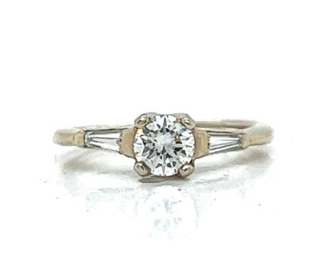 14K White Gold 0.55 Ct. Diamond Ring.&nbsp; &nbsp; &nbsp; Weighing 2.6 grams&nbsp; Set with an app. 0.55 Ct. Diamond in Cente
