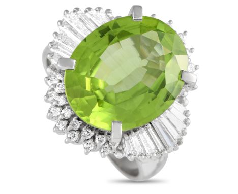 Platinum 0.60ct Diamond and Peridot Ring.&nbsp; &nbsp; &nbsp; &nbsp; &nbsp; &nbsp; Weight:9.7 grams Ring Top Height:10 Metal: