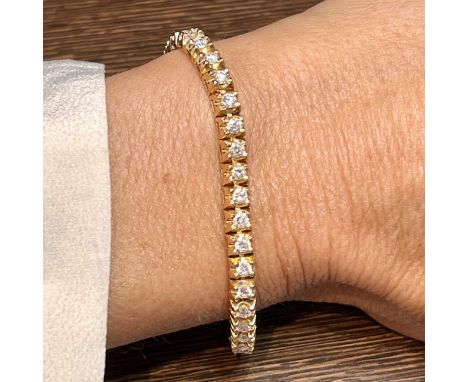 18K Yellow Gold Diamond Ankle Tennis Bracelet.&nbsp; &nbsp; &nbsp; &nbsp; Weighing 24.5 grams Set with 52 Diamonds weighing a