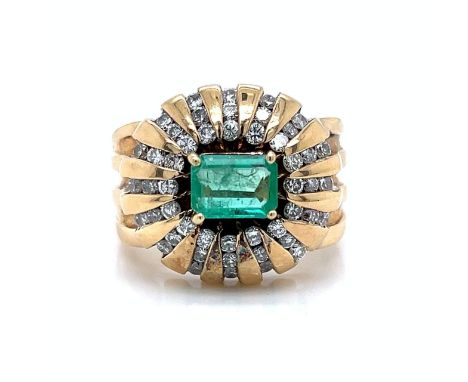 Retro 14K Yellow Gold Emerald &amp; Diamond Ring. &nbsp; &nbsp; &nbsp; &nbsp; &nbsp; Weighing 25.5 grams Set with an app. 2.0