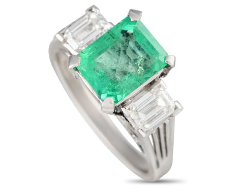 Platinum 0.73ct Diamond and Emerald Ring. &nbsp; &nbsp; &nbsp; &nbsp; &nbsp; &nbsp; Weight:6.4 grams Ring Top Height:11 Metal