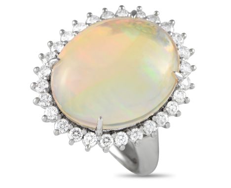 Platinum 0.72ct Diamond and Opal Ring. &nbsp; &nbsp; &nbsp; &nbsp; &nbsp; &nbsp; &nbsp; &nbsp; &nbsp; &nbsp; &nbsp; Weight:14
