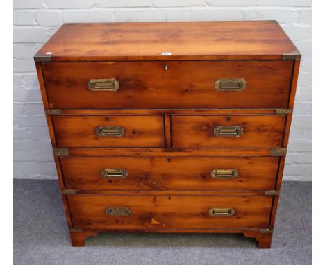 A campaign style brass bound yew secretaire chest, the fitted drawer over two short and two long drawers on bracket feet, 91c