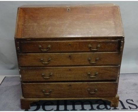 A George III mahogany bureau with four long graduated drawers on bracket feet, 99cm wide x 105cm high. 