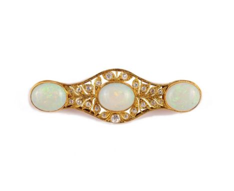 A gold, opal and diamond brooch, of shaped elliptical form, mounted with three oval opals, otherwise with pierced foliate dec