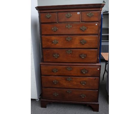 A George III mahogany chest on chest, of two short and six long graduated drawers, on bracket feet, 106cm wide x 181cm high. 
