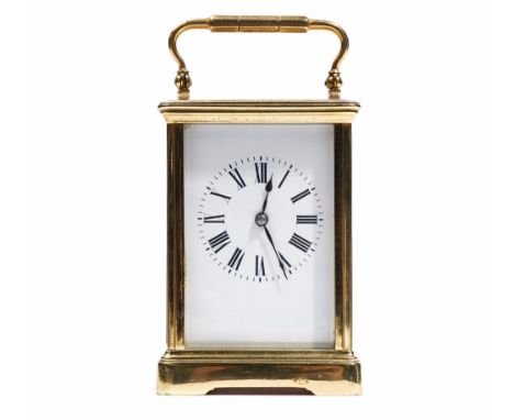 A French gilt-brass cased carriage clock, with visible platform escapement, detailed 'Made in Switzerland', single train move