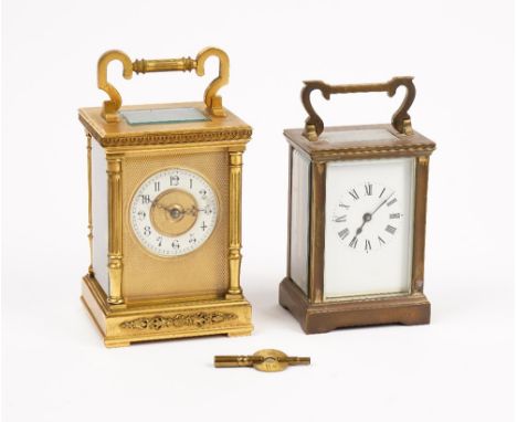 A French gilt brass carriage clock, with visible platform escapement, the twin train movement striking on a gong, backplate d