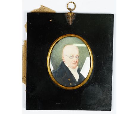 English School, early 19th Century, A portrait miniature of a gentleman wearing glasses, watercolour, 7.5 x 6cm.