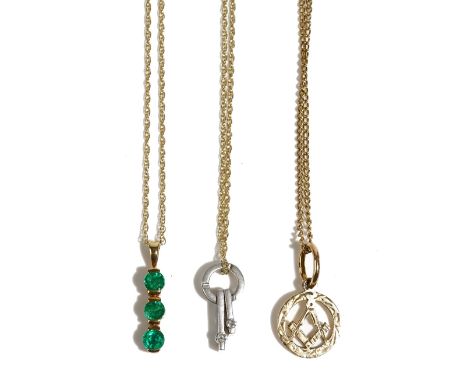 A 9ct gold and emerald three stone pendant, with a gold neckchain, on a boltring clasp, detailed 375, a diamond set two stone