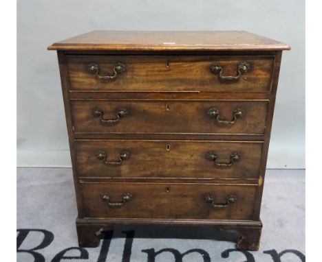 A late 18th century mahogany commode chest of four long graduated drawers on bracket feet, 67cm wide x 74cm high. 