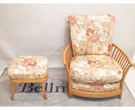 'ERCOL' ; A modern ash suite comprising a sofa, 185cm x 90cm high, two armchairs, 89cm wide x 98cm high, and a footstool, 50c