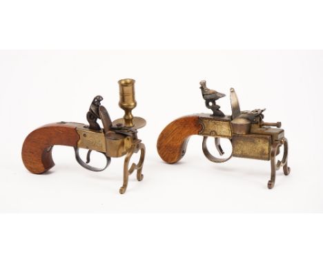 A Dunhill 'Tinderbox' pistol lighter, Patent no '592139', and a modern novelty tinder pistol lighter, detailed 'Made in Italy