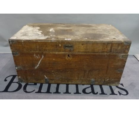 A late 19th century camphor wood trunk, with wrought iron carrying handles, 104cm wide x 52cm high x 51cm deep.