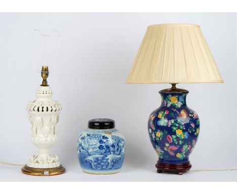 A white glazed pottery table lamp on a circular gilt painted base, 44cm high, a blue ground ceramic baluster table lamp decor