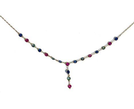 A gold, sapphire, ruby and green gemstone pendant necklace, the front and pendant drop spectacle set with a row of coloured g