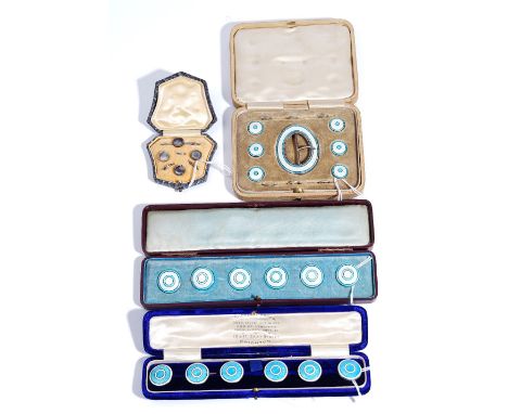 A set of six silver and enamelled buttons, decorated with pale blue and white enamel, detailed Sterling, cased, a set of six 