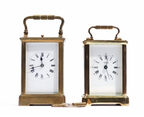 A French brass carriage clock, late 19th century, with visible platform lever escapement, twin train movment and hour repeat 