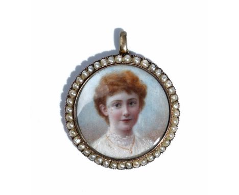 A gold and seed pearl set circular pendant locket, circa 1910, glazed with a portrait miniature of a lady within a surround o