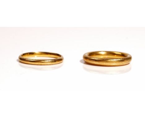 A 22ct gold plain wedding ring, Birmingham 1924, ring size I and a half and a 22ct gold plain wedding ring, London 1950, ring