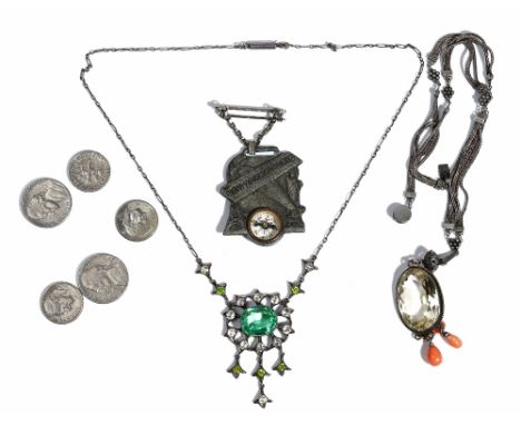 A citrine and coral pendant necklace, the front collet set with an oval cut citrine above three pendant coral drops, a pale g