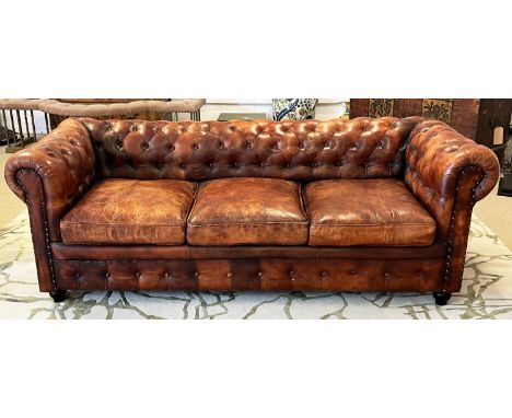 CHESTERFIELD SOFA, three seater, buttoned and studded tan leather, 210cm W. 