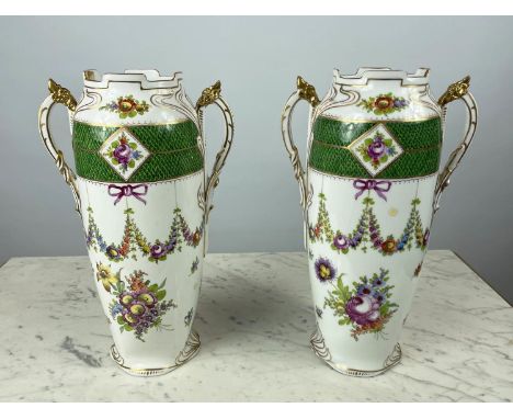 DRESDEN VASES, a pair, twin handled with foliate decoration, green bands and gilt highlights, 36cm H. (2) 