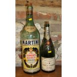 An over-sized Martini bottle, 20" high, and a Moet Chandon magnum champagne bottle