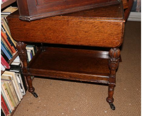 A nest of three oak occasional tables, largest 36" x 17", an oak circular occasional table, 16" dia, an oak two-tier service 