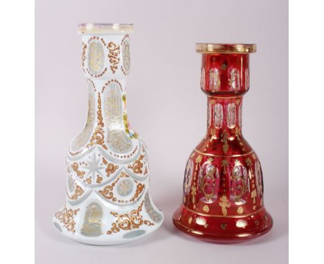 A 20th century Bohemian ruby glass mallet-shaped vase with gilt decoration, 10" high, and a similar milk glass mallet-shaped 