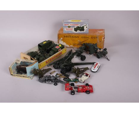 A Dinky Toys die-cast model 88mm gun, a Military Ambulance, an Armoured Personnel Carrier, an Army Wagon and other vehicles 