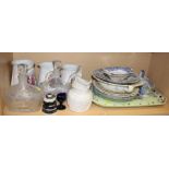 An 18th century Delft blue and white plate, decorated floral sprays, 9" dia, a pair of blue and