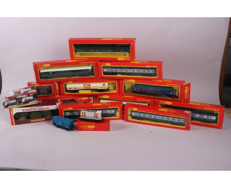 A large collection of Hornby OO gauge model railway carriages, track and accessories, mostly boxed 