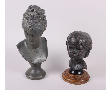 K Carter: a bronzed bust of a young child, signed, marked 11:20, on oak stand, 8 3/4" high, and an anodised bust of Marie Ant